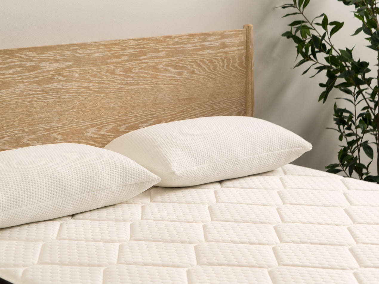 Plank premium shredded foam pillow on plank firm luxe left angle